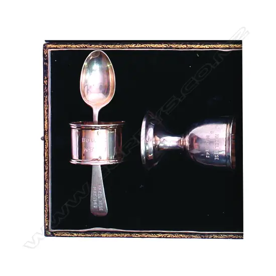 An Indian silver christening set of egg cup