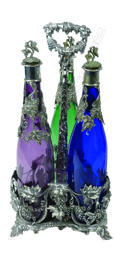 A silver plate and three-bottle decanter stand Image 1++