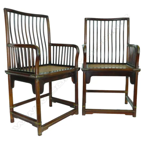 A pair of antique Chinese hardwood armchairs