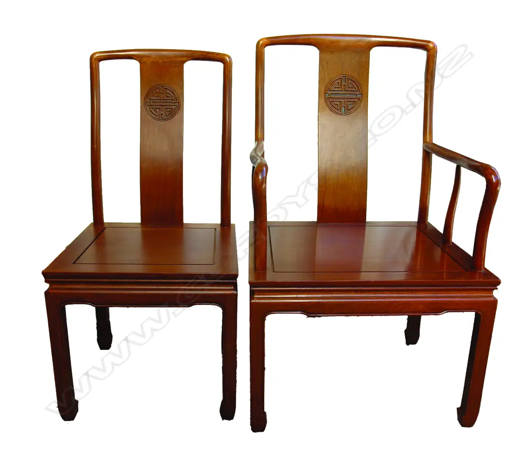 A Chinese rosewood extension dining table and 10 chairs Image 1++