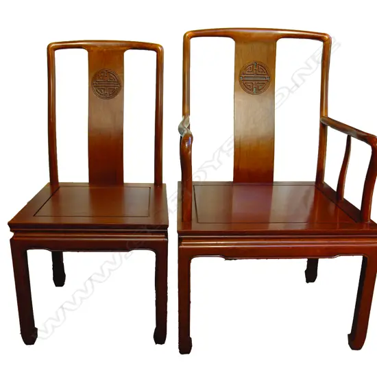 A Chinese rosewood extension dining table and 10 chairs