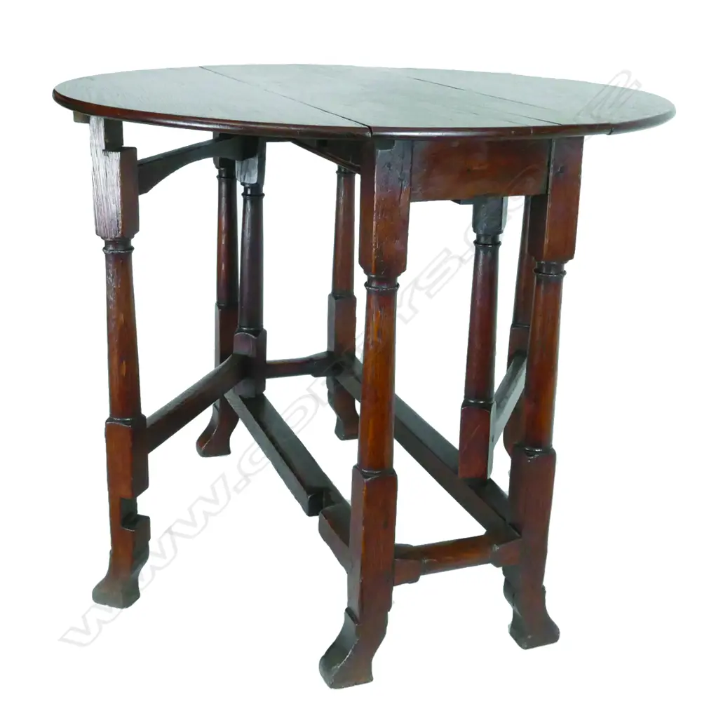 A small antique English oak gate leg table Image 1++
