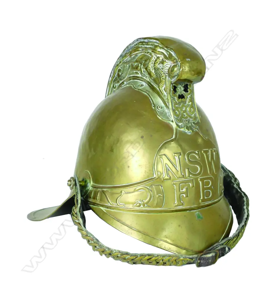 An antique brass Merryweather type brass fireman's helmet badged for the New South Wales Fire Brigade Image 1++