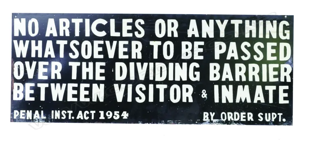 A black and white enamelled sign Image 1++