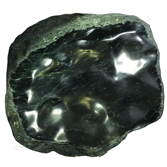 A large N.Z. pounamu river boulder
