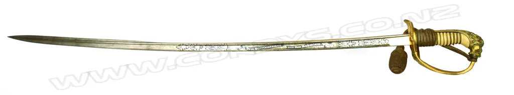 An historically interesting German naval dress sword presented to Oberleutnant Hans-Joachim Rahmlom. Rahmlow gained infamy from a unique incident of capitulation when in August 1941 as Kapitänleutnant of the WWII German submarine U-570 under attack he surrendered Image 1++