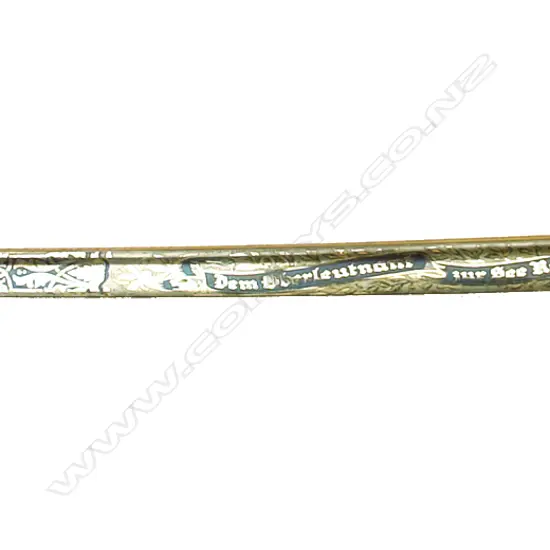 An historically interesting German naval dress sword presented to Oberleutnant Hans-Joachim Rahmlom. Rahmlow gained infamy from a unique incident of capitulation when in August 1941 as Kapitänleutnant of the WWII German submarine U-570 under attack he surrendered