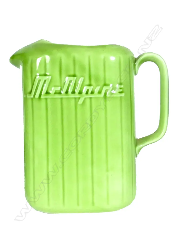 A Crown Lynn 'McAlpine' green glazed fridge jug Image 1++