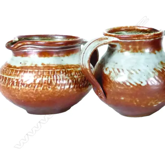 Two Len Castle shino glazed jugs