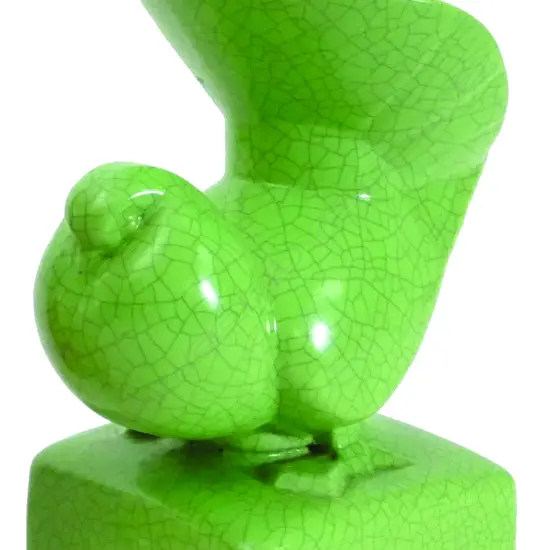 A French Art Deco green crackle graze pigeon in the manner of Charles Lemanceau for Primavera