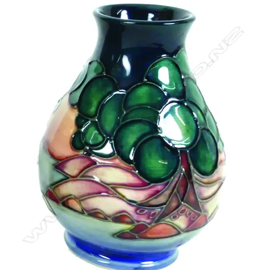 A modern Moorcroft postal scene pattern vase