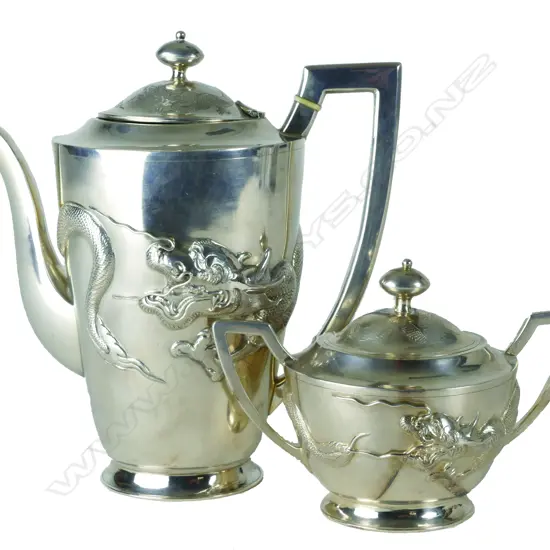 A c.1920s Chinese silver Tack Hing coffee pot and lidded sugar bowl