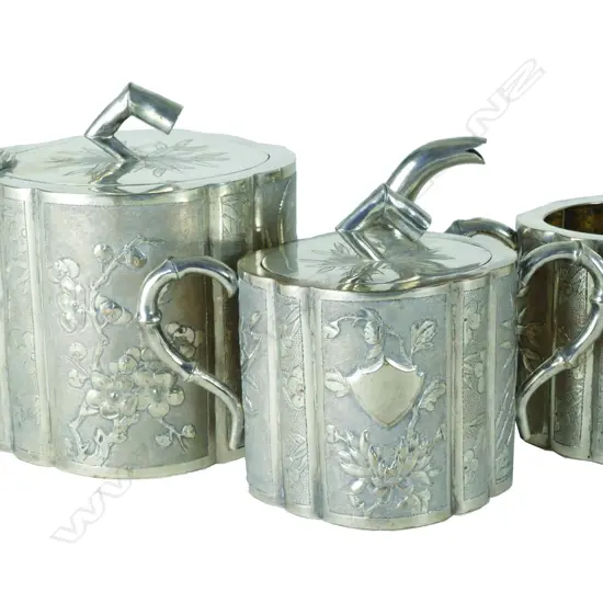 A late 19thC Chinese silver three piece tea set