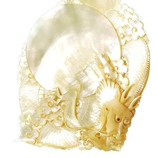 A vintage finely carved pearl shell