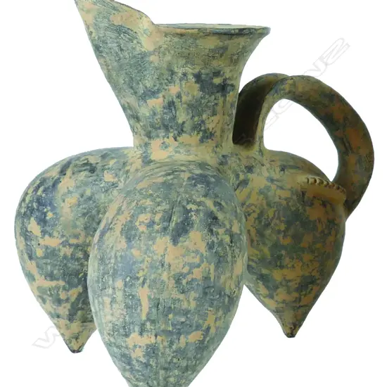 An archaic earthenware tripod ewer
