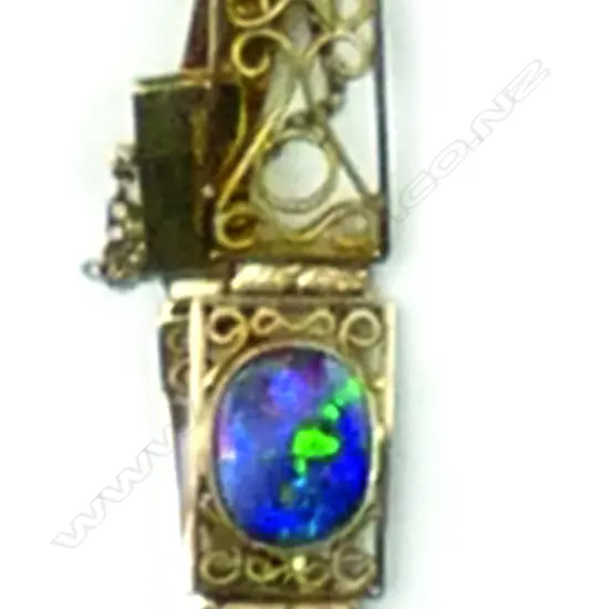 A 9ct. gold and opal bracelet