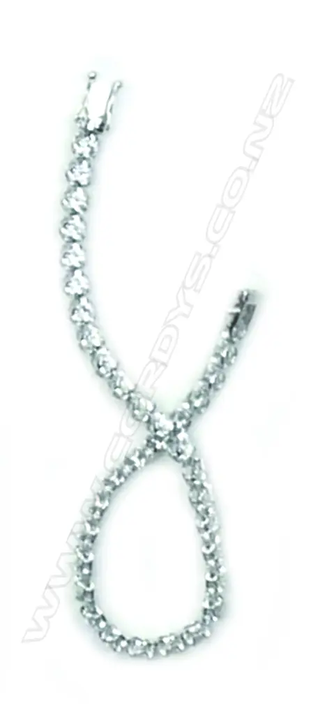 A lady's modern 18ct. white gold and diamond tennis bracelet Image 1++
