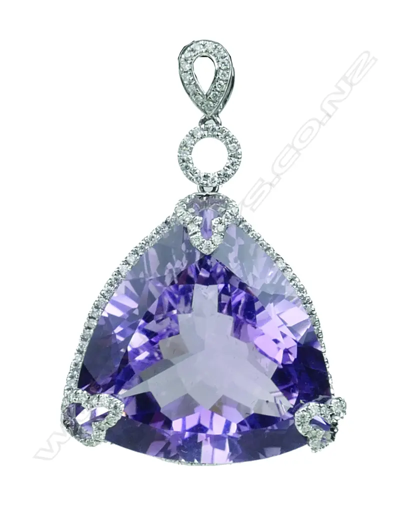 An impressive 18ct. white gold large single amethyst and diamond pendant Image 1++