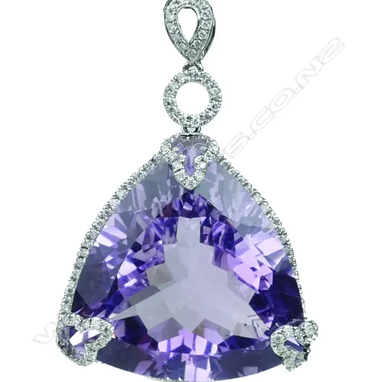 An impressive 18ct. white gold large single amethyst and diamond pendant