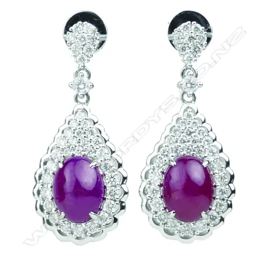 A pair of 18ct. ruby and diamond drop earrings