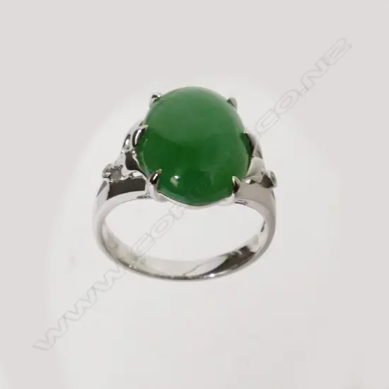An 18ct. white gold and jade ring