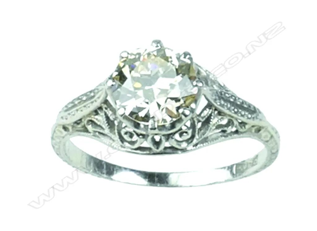 An estate platinum and diamond solitaire ring Image 1++