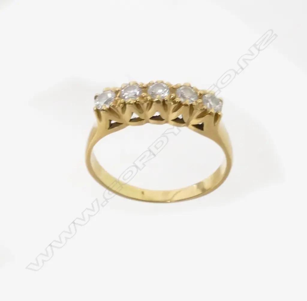 Two 18ct. gold and diamond rings Image 1++