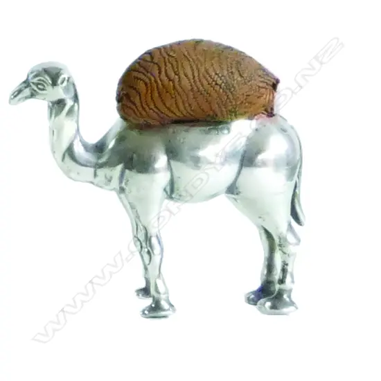 A rare early 20thC silver novelty camel pin cushion
