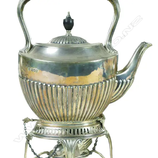 An Edwardian silver tea kettle on stand
