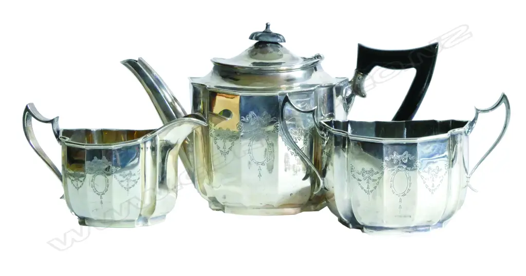An Edwardian Bachelor's silver three-piece tea set Image 1++