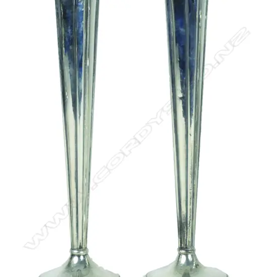 A pair of tall elegant American sterling silver candlesticks