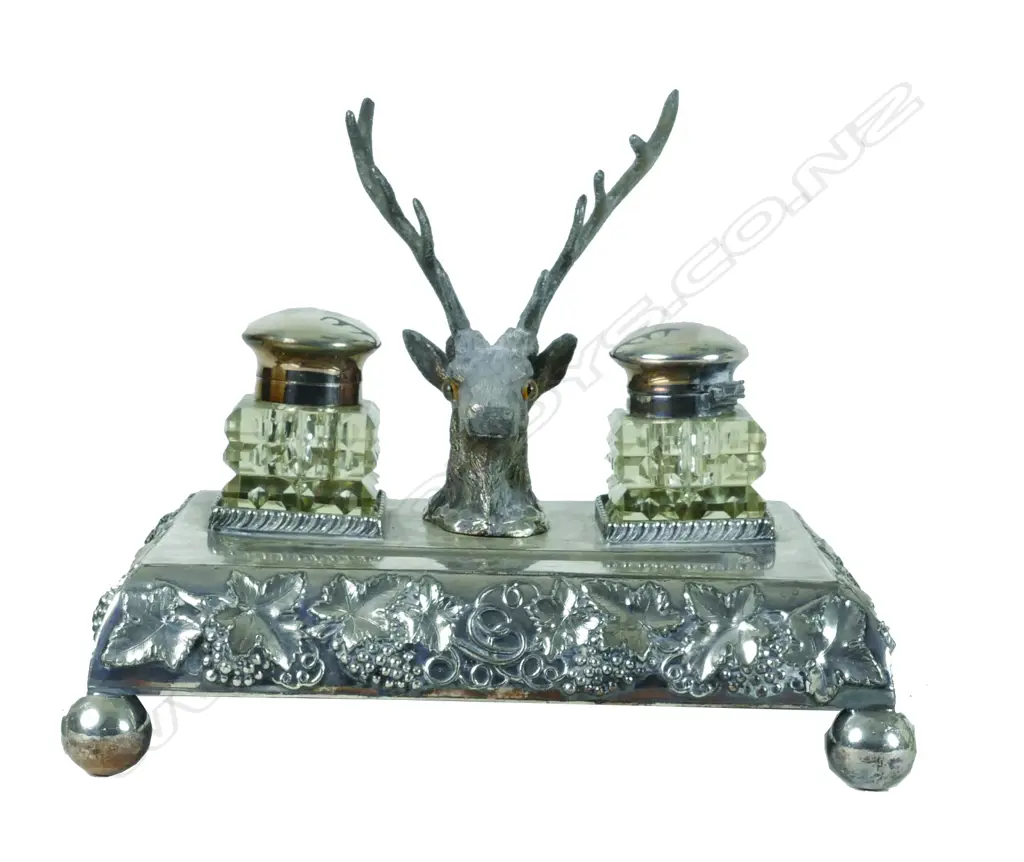 A Victorian silver plated ink stand with two inkwells and a deer's head pen holder Image 1++