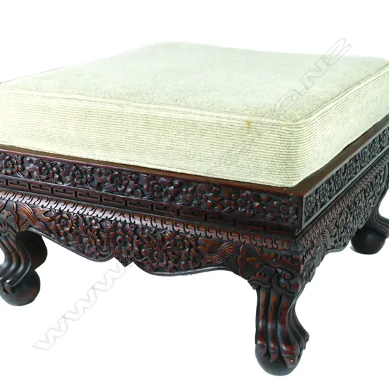 A pair of Asian teak ottomans