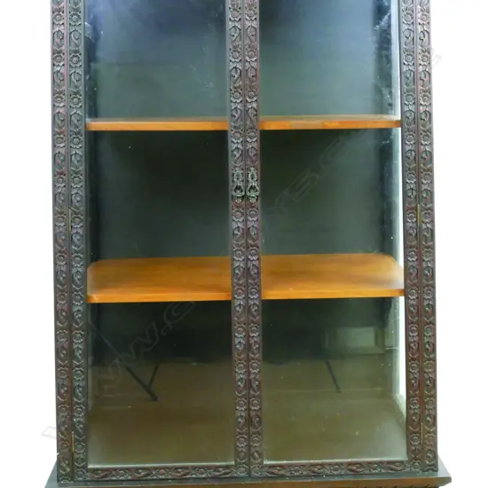 An Asian teak framed double door display vitrine