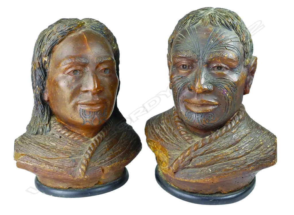 A pair of late 19thC large carved kauri gum busts of a Maori chief and chieftainess Image 1++