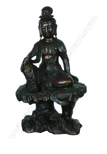 A cast metal statuette of Kuanyin Image 1++