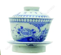 A pair of Chinese blue and white porcelain cups and covers on stands Image 1++