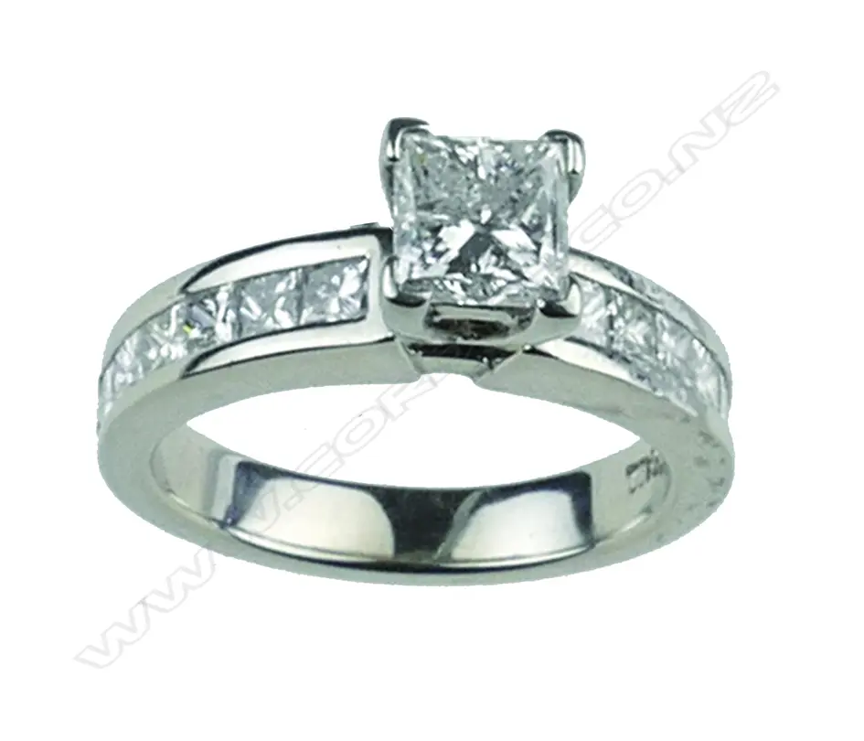 A palladium and diamond solitaire ring Image 1++