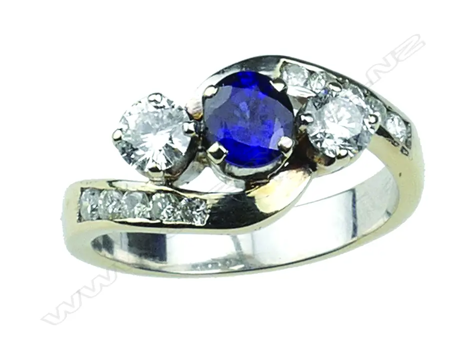 An 18ct. white gold sapphire and diamond ring Image 1++