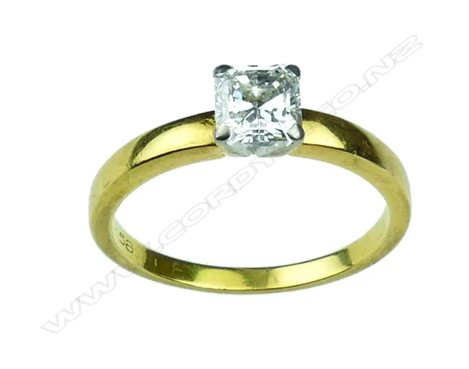 An 18ct gold and diamond solitaire ring Image 1++