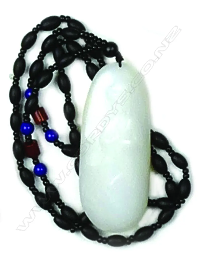 A Chinese Hotan white jade carved pendant Image 1++