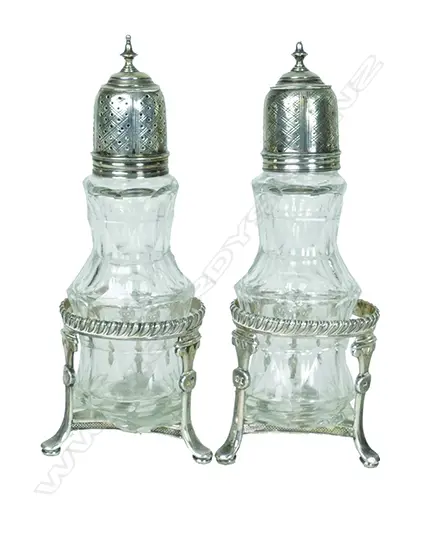 A pair of cruet bottles with silver tops Image 1++