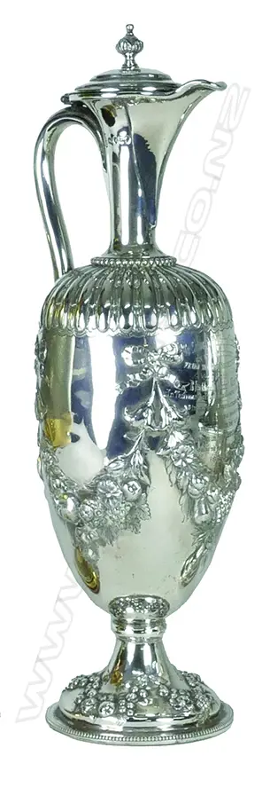 A Victorian silver claret jug of baluster shape Image 1++