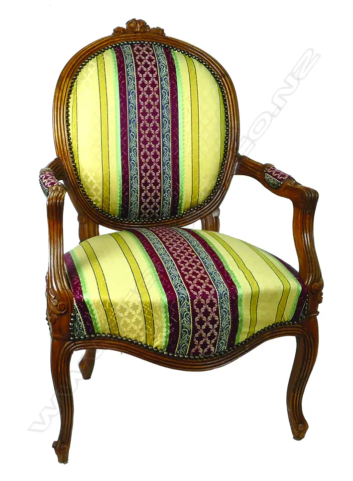 A pair of French walnut open elbow chairs of Louis XV style Image 1++