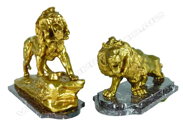 A pair of gilt bronze lions in the manner of Antoine-Louis Barye Image 1++