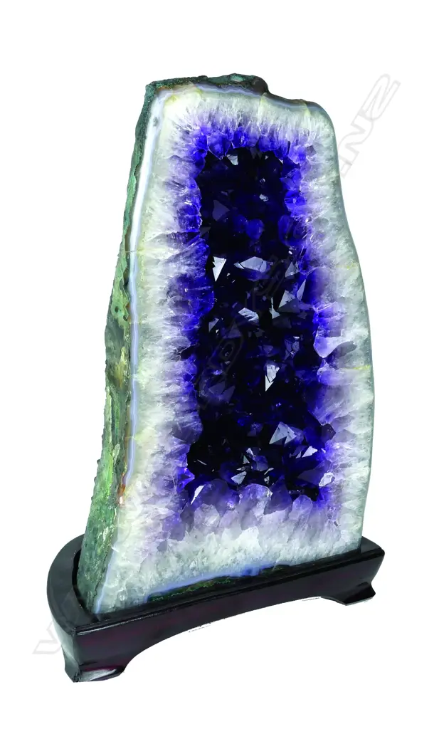 A striking cut and polished amethyst quartz geode Image 1++