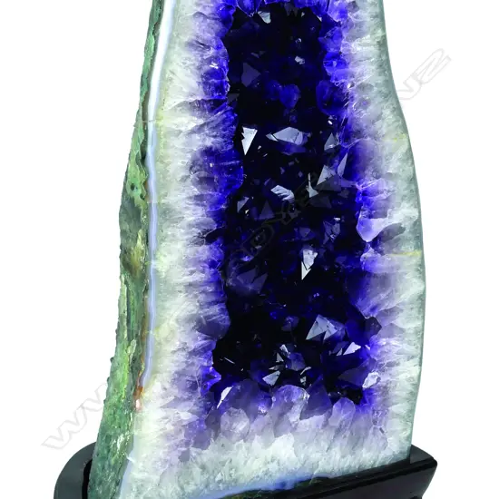 A striking cut and polished amethyst quartz geode
