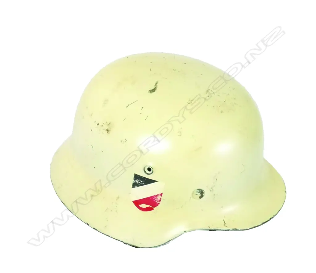 A German WWII M35 helmet in cream paint finish Image 1++