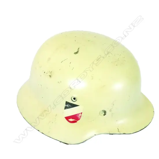 A German WWII M35 helmet in cream paint finish