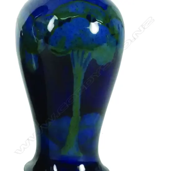 A rare William Moorcroft 'Moonlit Blue' baluster vase